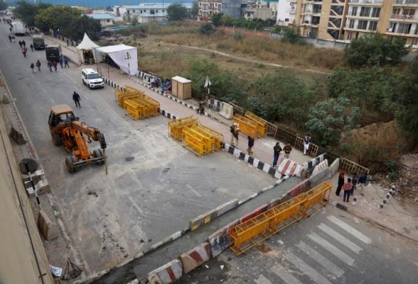 Police barricades are erected on a natio<em></em>nal highway to stop farmers, who are marching towards New Delhi to press for the better crop prices promised to them in 2021, at the Delhi-Uttar Pradesh border in Ghaziabad, India, February 12, 2024. REUTERS/Adnan Abidi